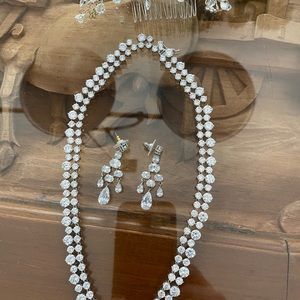 Necklace , earrings, hair piece